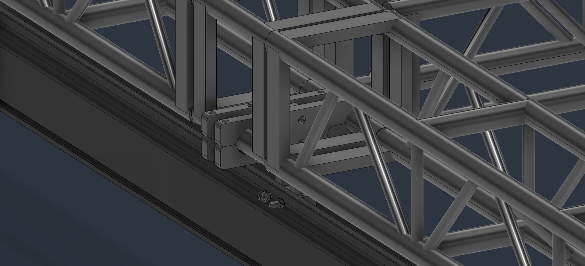 Custom hanger connecting a rail to a truss chord.