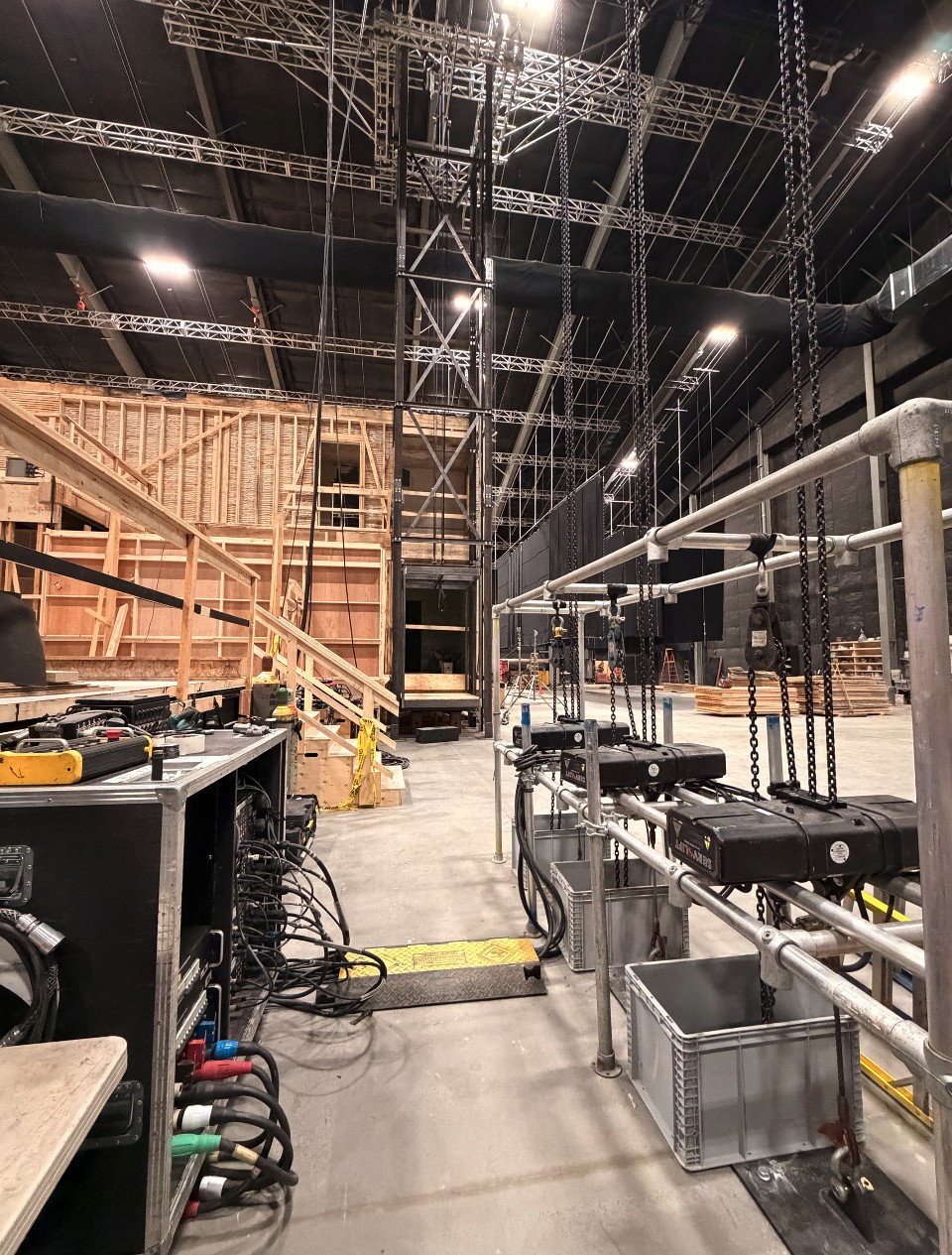 Studio elevator tower with chain hoists overhead.